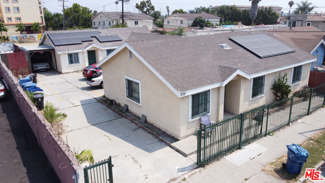 a aerial view of a house with large windows