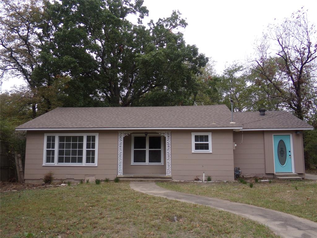 front view of a house and a yard