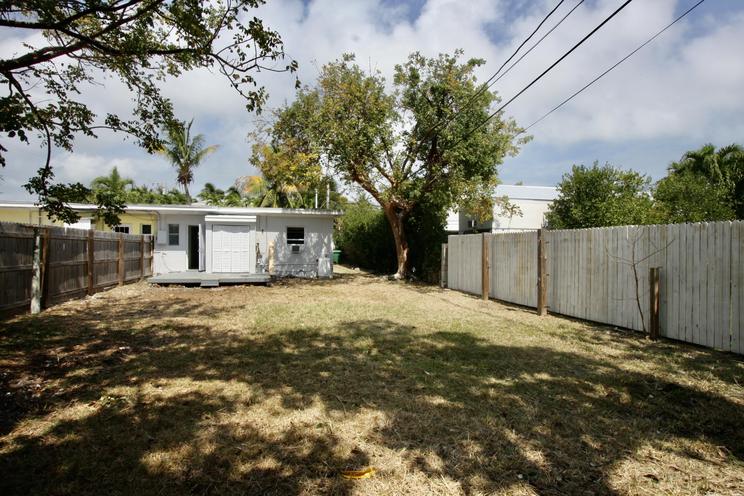 a front view of a house with a garage