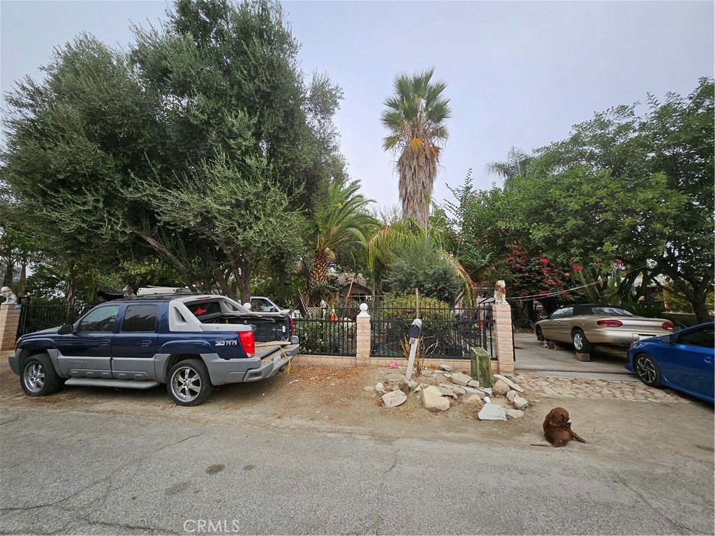 a view of a car parked in front of a house