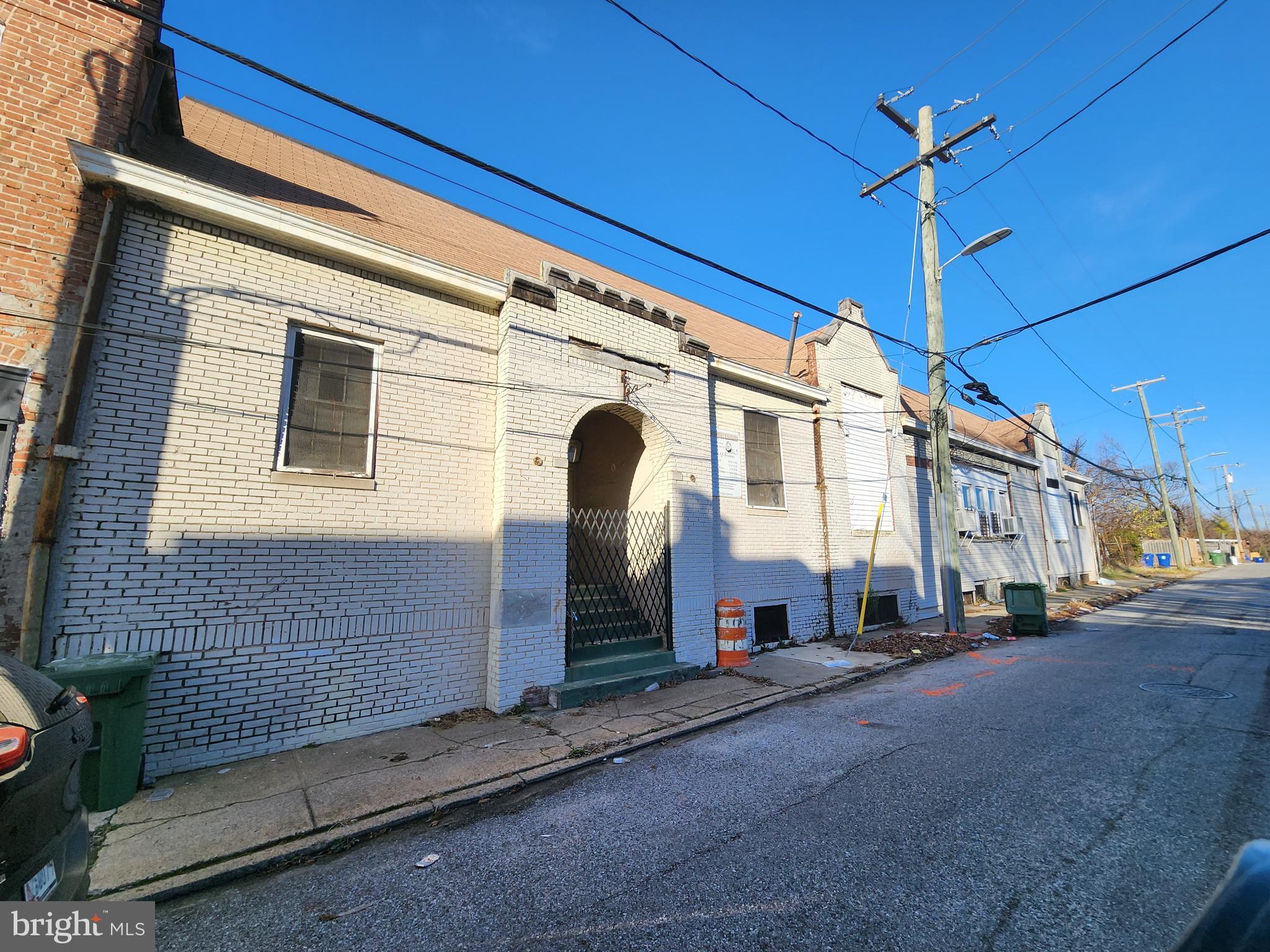 a front view of a building with traffic signal