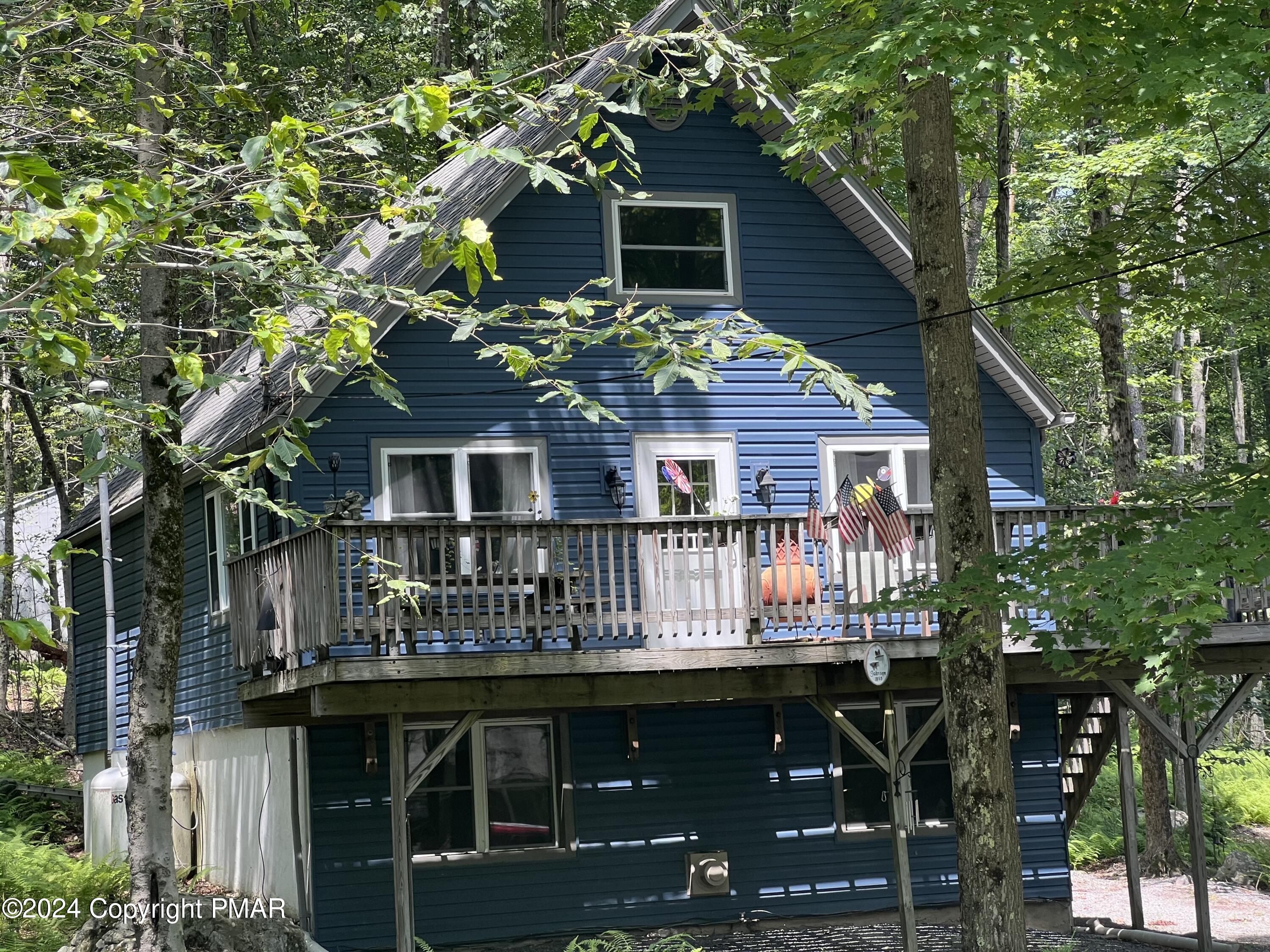 a front view of a house with balcony