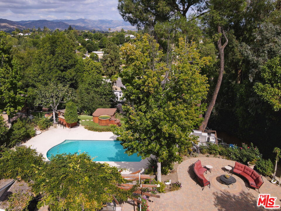 a view of a backyard of the house