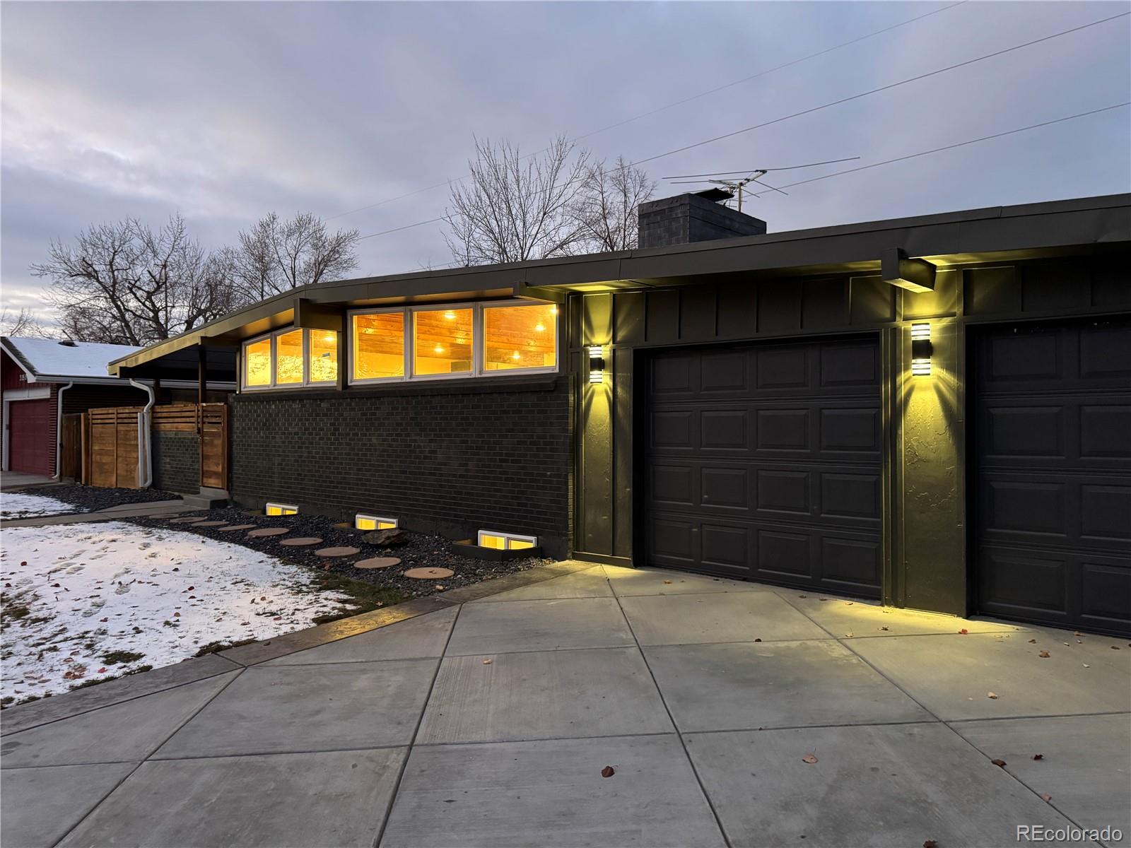 a front view of a house with a garage