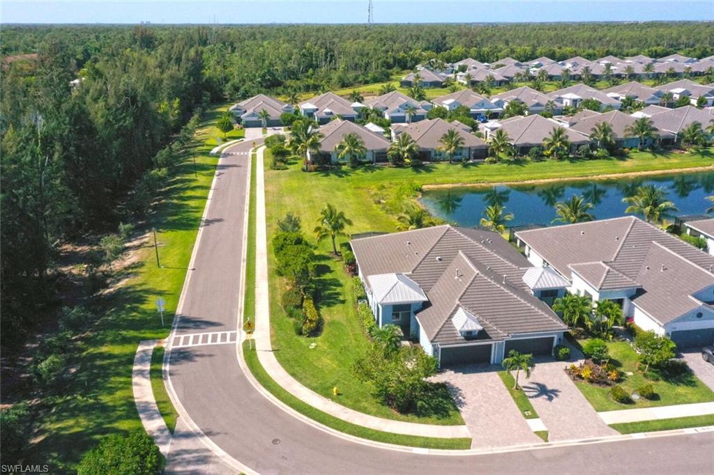 an aerial view of a house with a garden