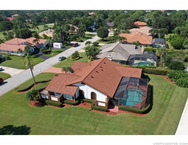 $589,900 | 1311 Southwest Cottonwood Cove | St. Lucie West Country Club