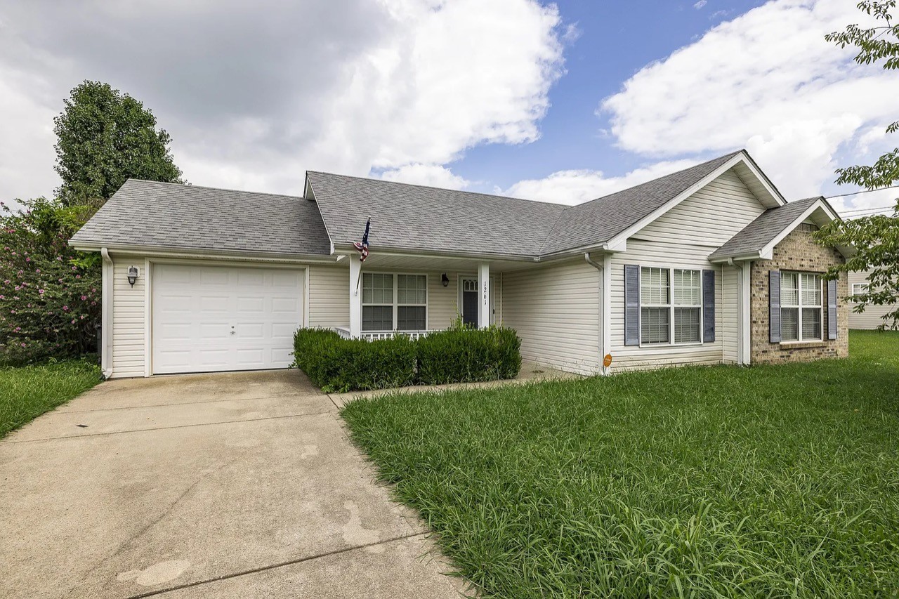 front view of a house and a yard