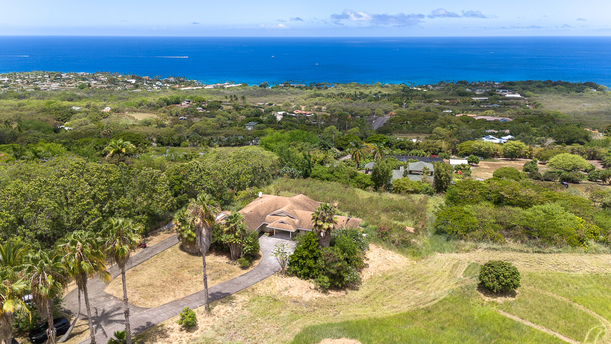 77-6480 Kuakini Hwy features a 5 acre property with a 4bd/3bth home and an office with amazing views from almost every room.