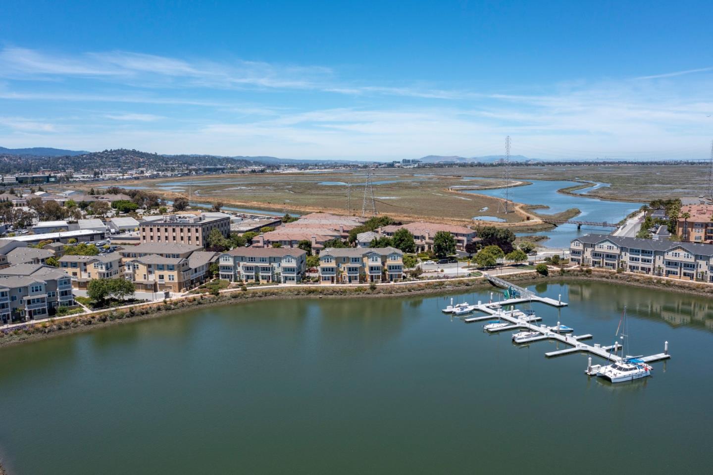 an aerial view of a city with lawn chairs