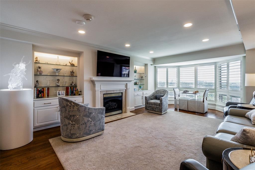 a living room with furniture or fireplace and a flat screen tv