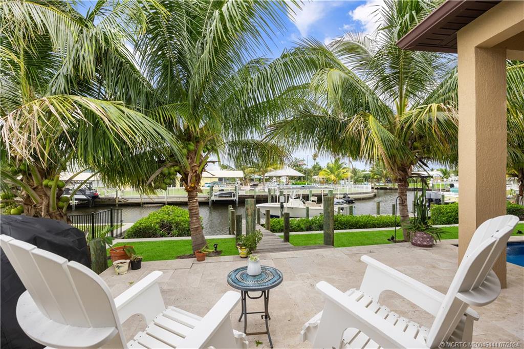 a view of a chairs and tables in the patio