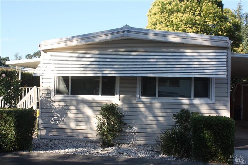 a front view of house with yard