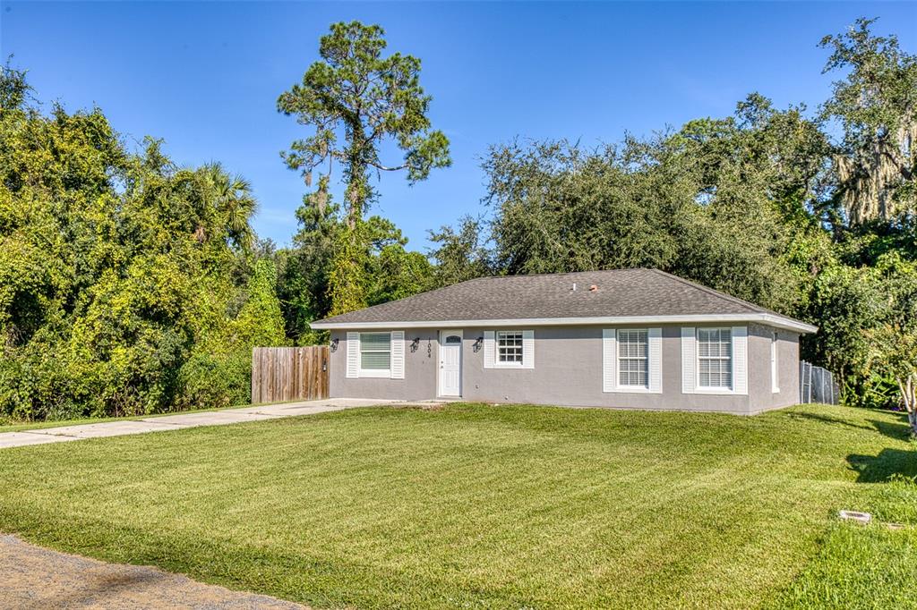 a house view with a garden space