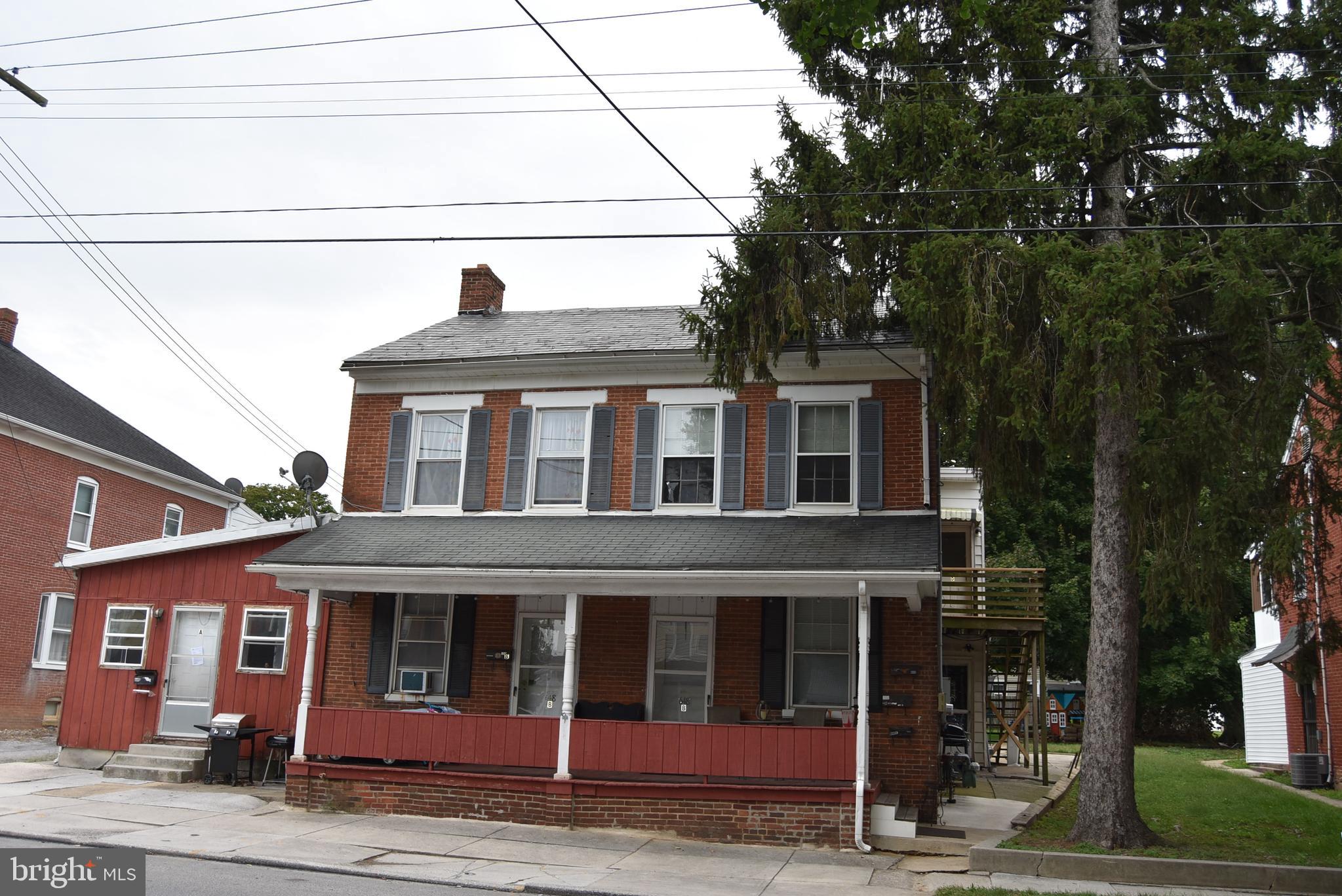 front view of a house with a pathway