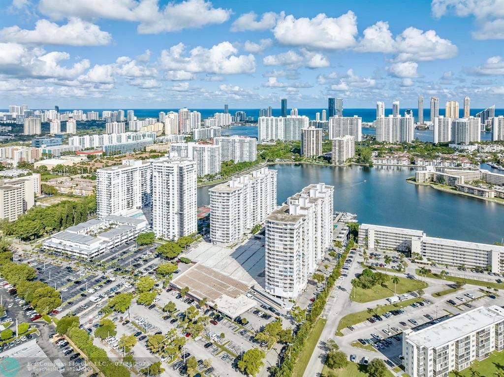 a view of a city with an ocean