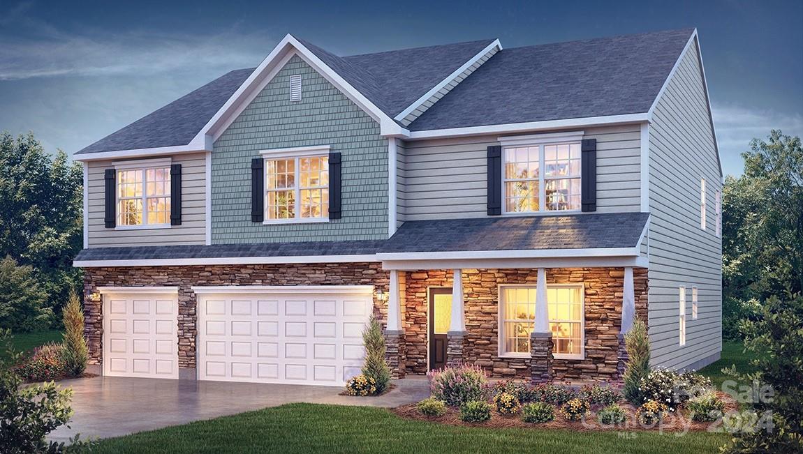 front view of a house and a yard