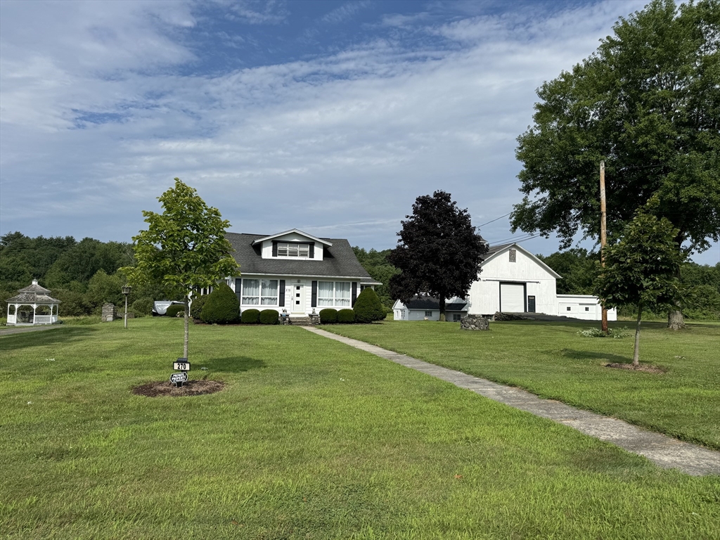 a house with garden in front of it