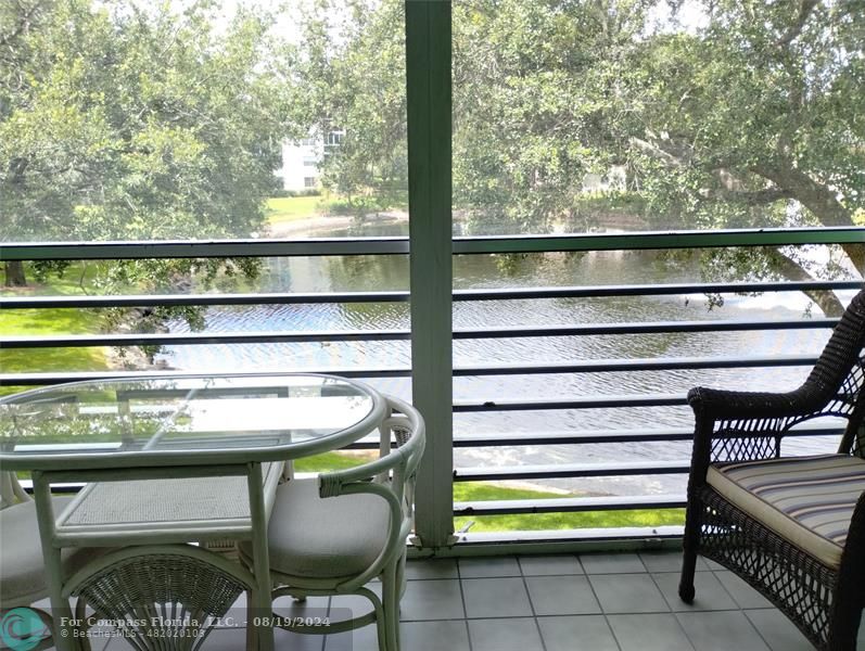 a close view of dining table and chairs