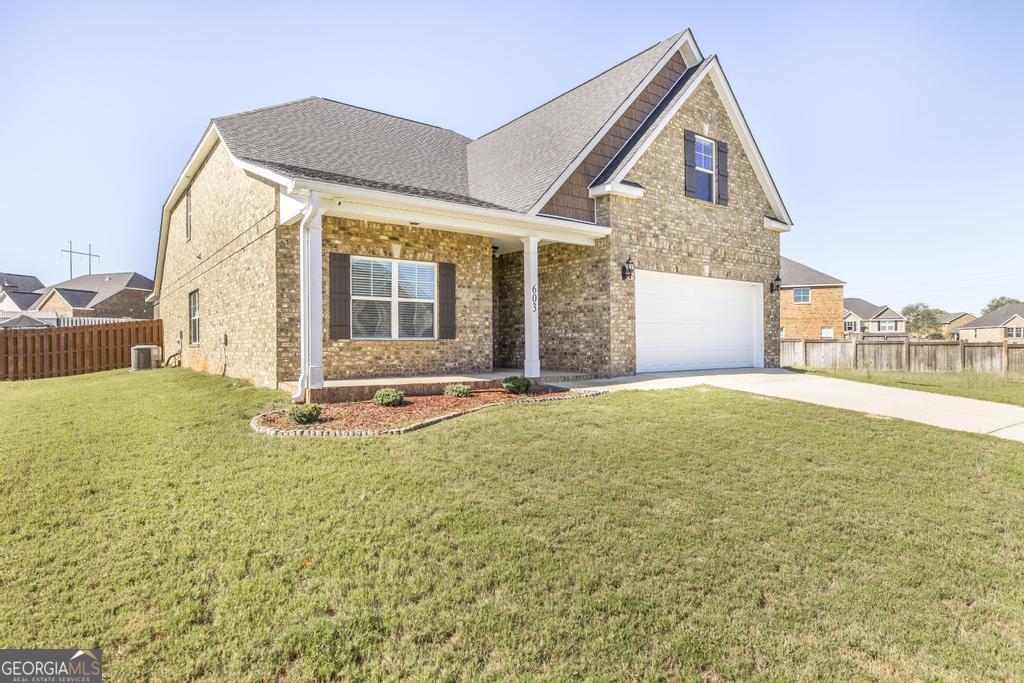 a front view of house with yard