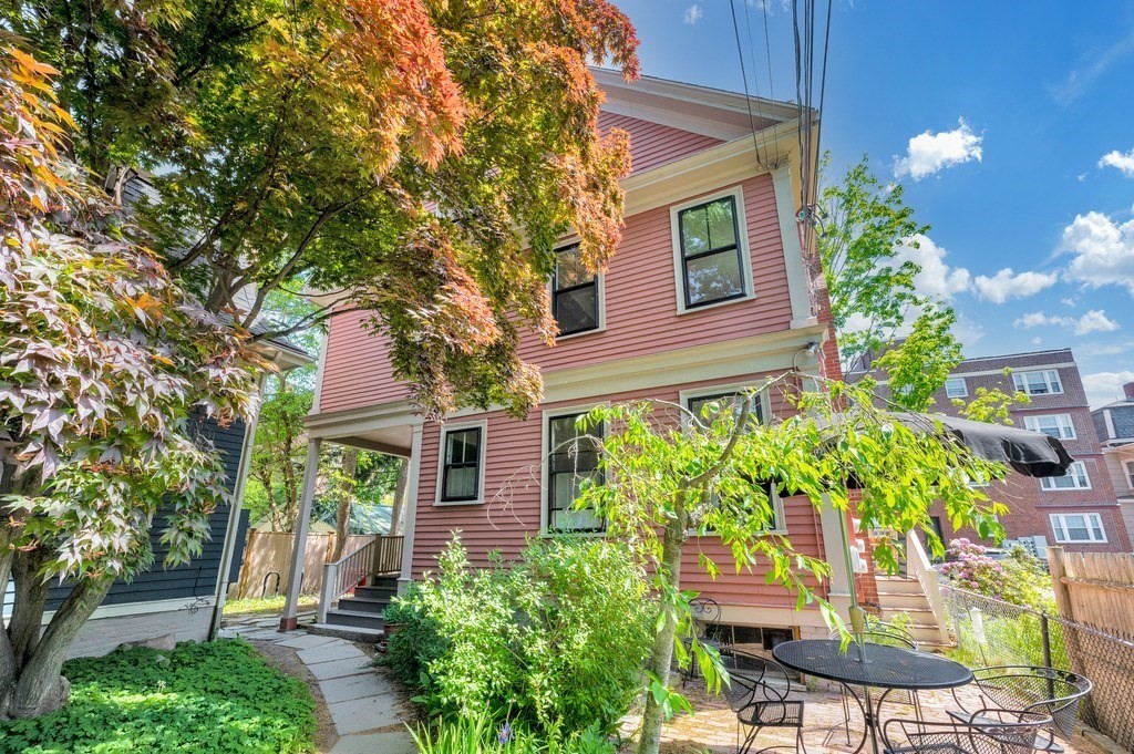 a house with a flower garden