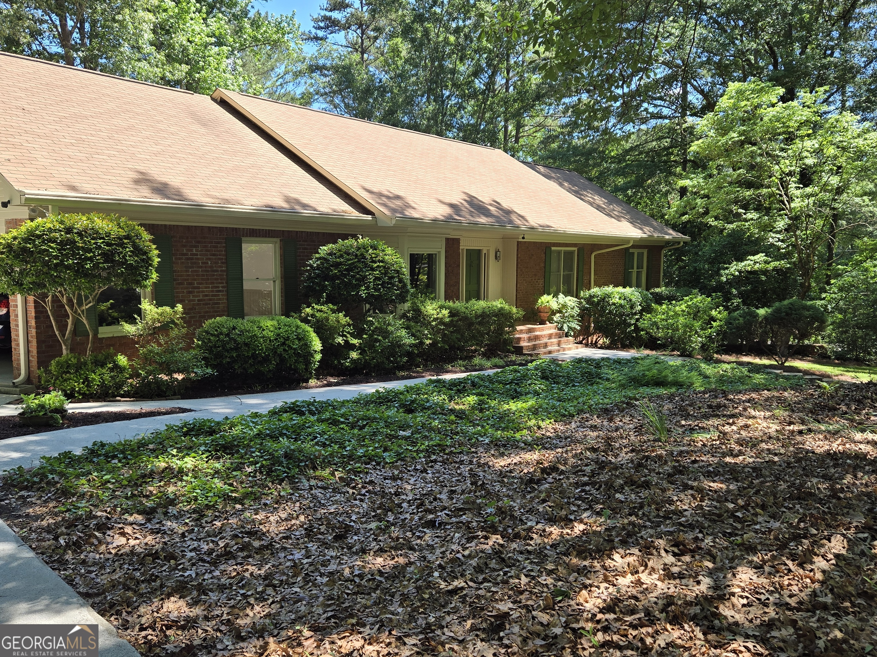 a view of a house with garden