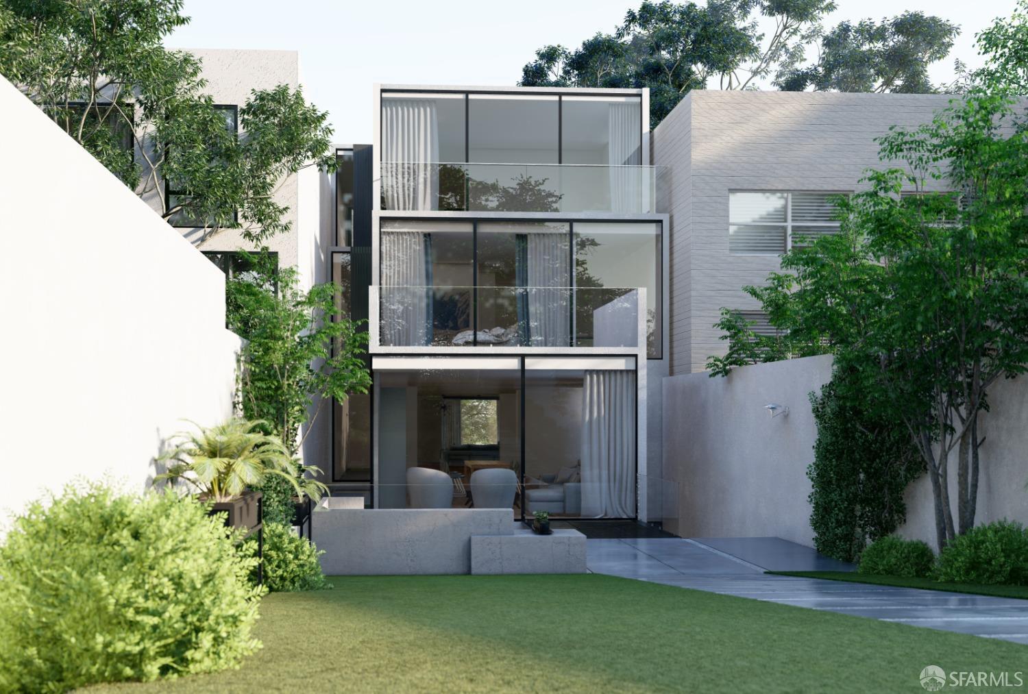 aerial view of a house with a yard and sitting area