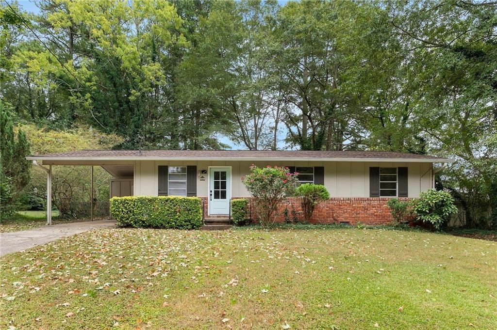 front view of a house with a yard