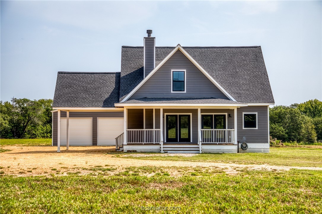 a front view of a house with swimming pool