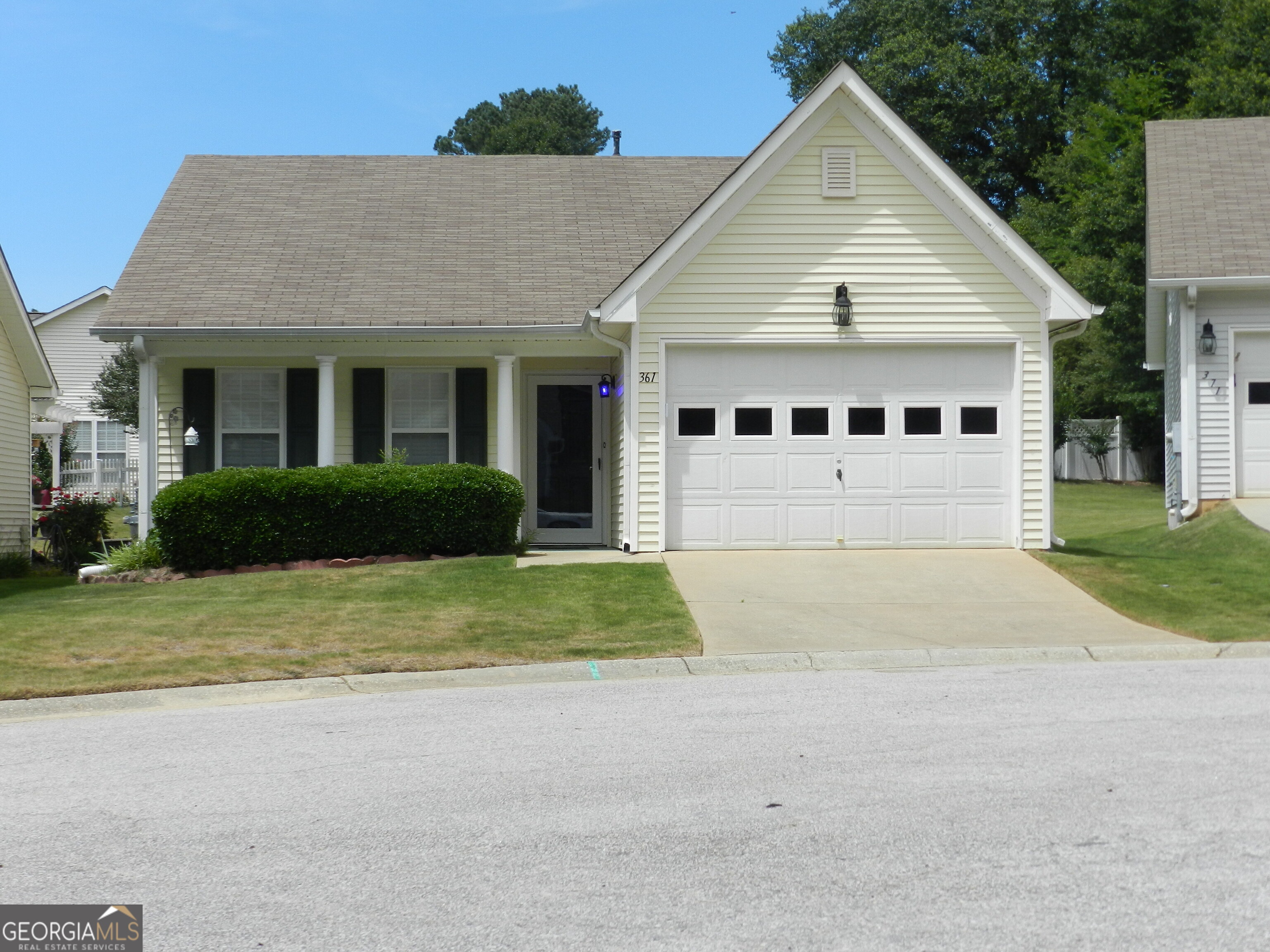 a view of outdoor space yard and garage