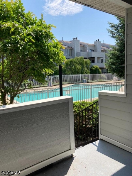 a view of a balcony with an outdoor space