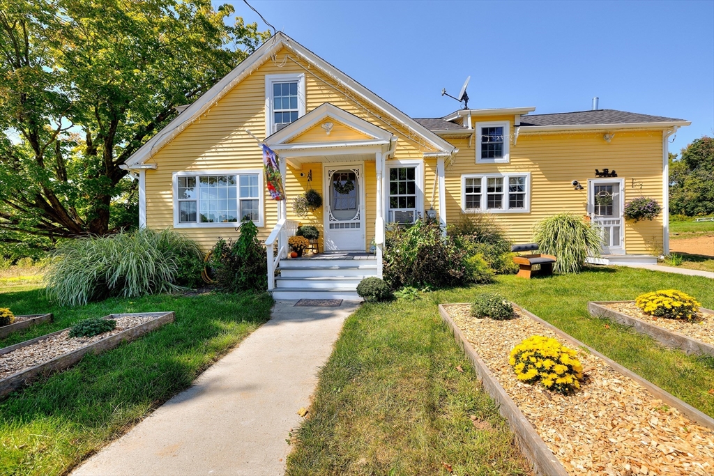 a view of a house with garden