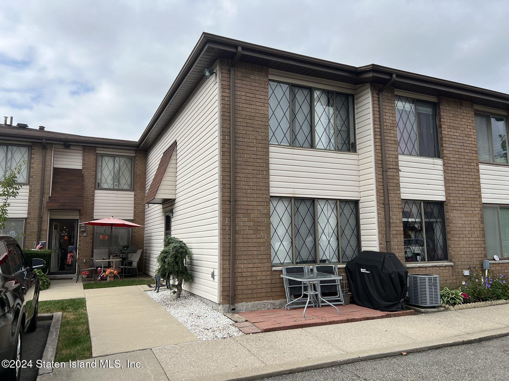 a view of a house with patio