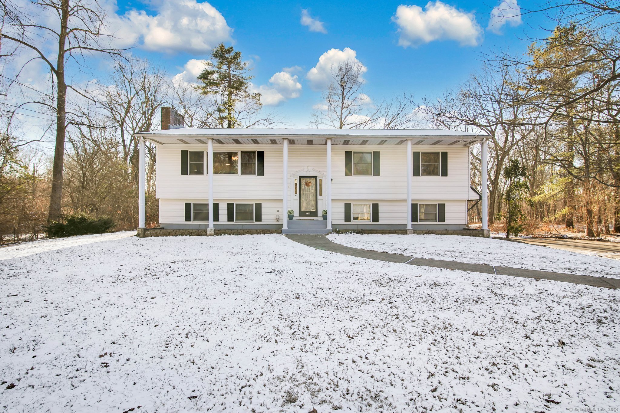 Front of 122 Winkler Road, East Windsor. Set back from the street, with a wide, circular driveway, this home has so many features!