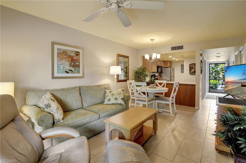 Private & Quiet location in complex! Enjoy your extended screened lanai that living room and guest bedroom sliders open on to.
