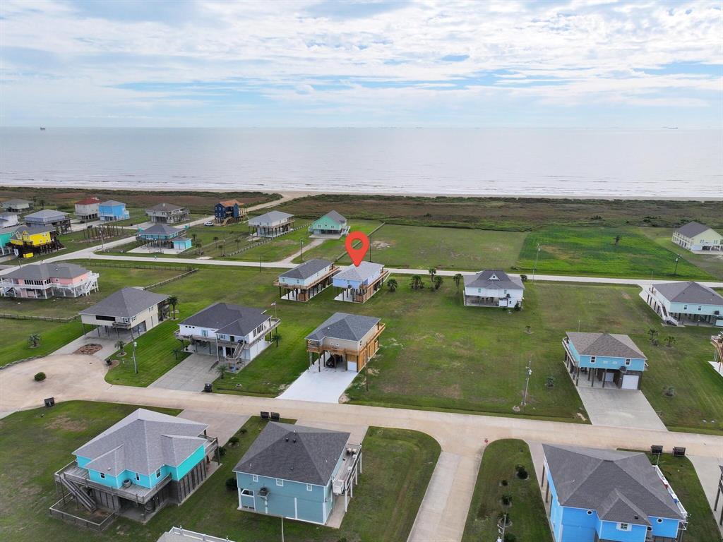 an aerial view of a houses with outdoor space