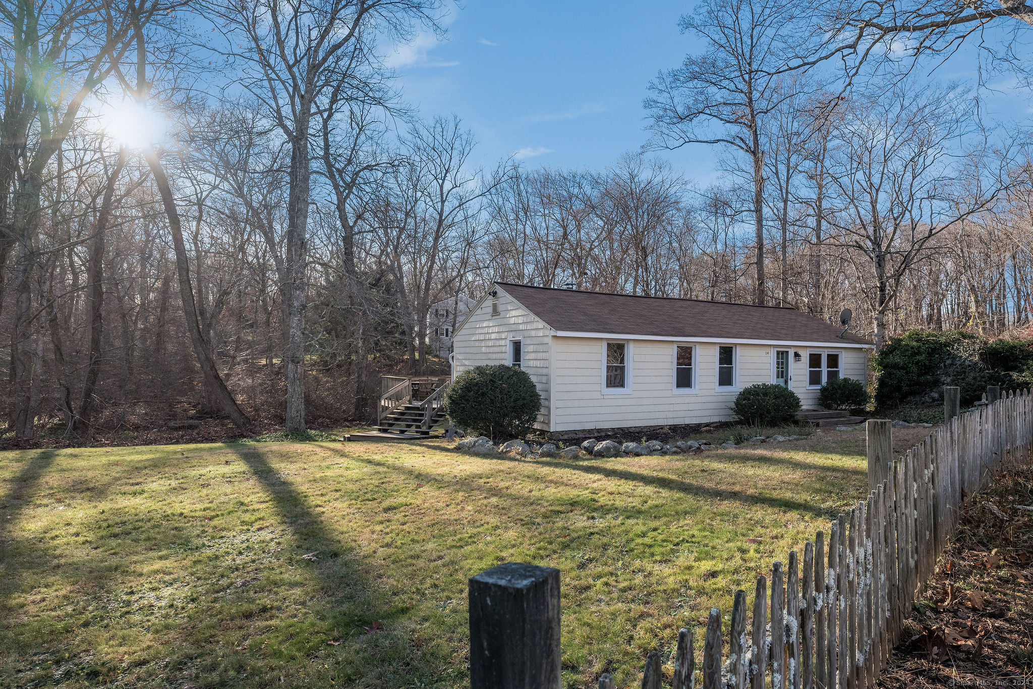 a view of a house with a big yard