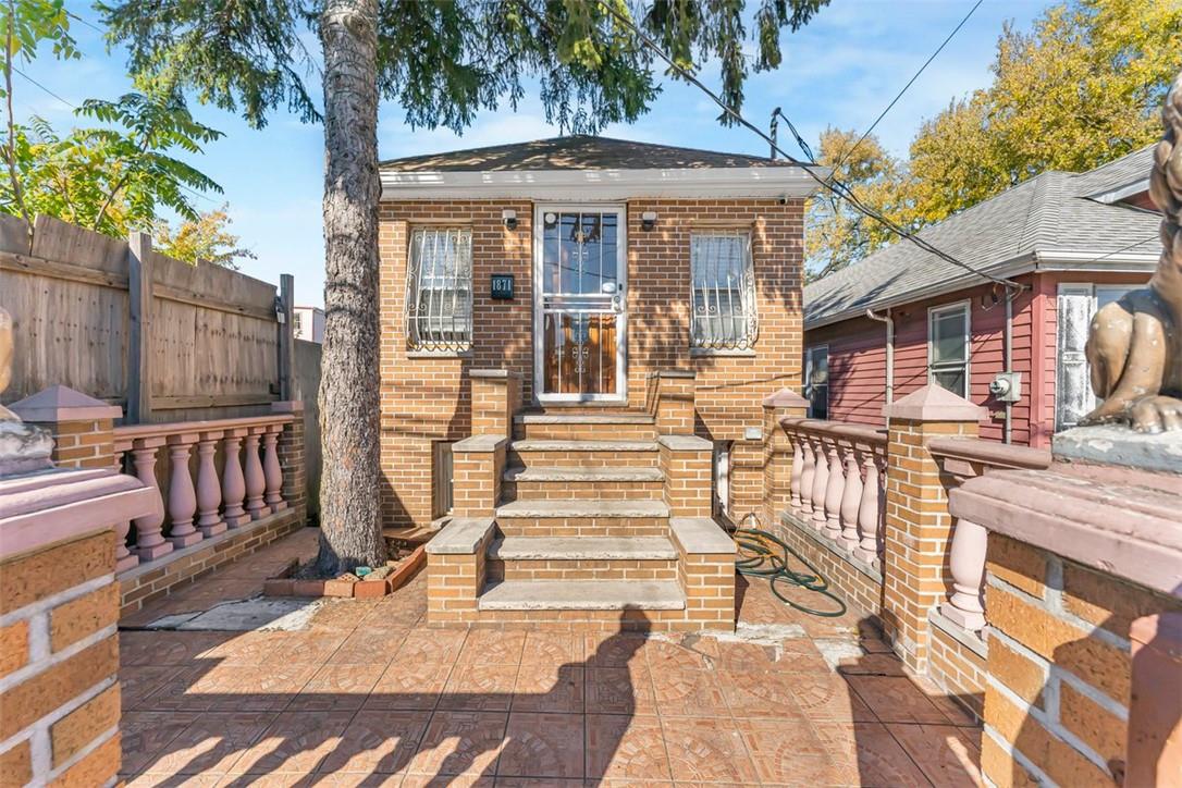 View of front of house with a patio area