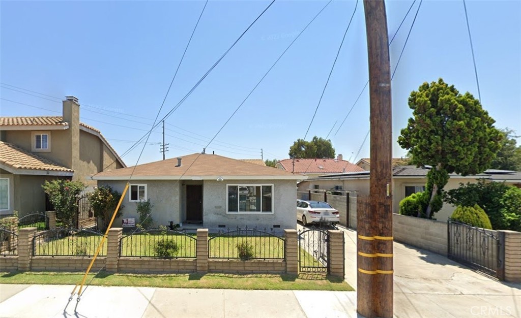 a front view of a house with swimming pool