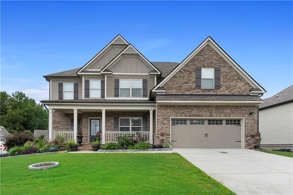 front view of a house with a yard