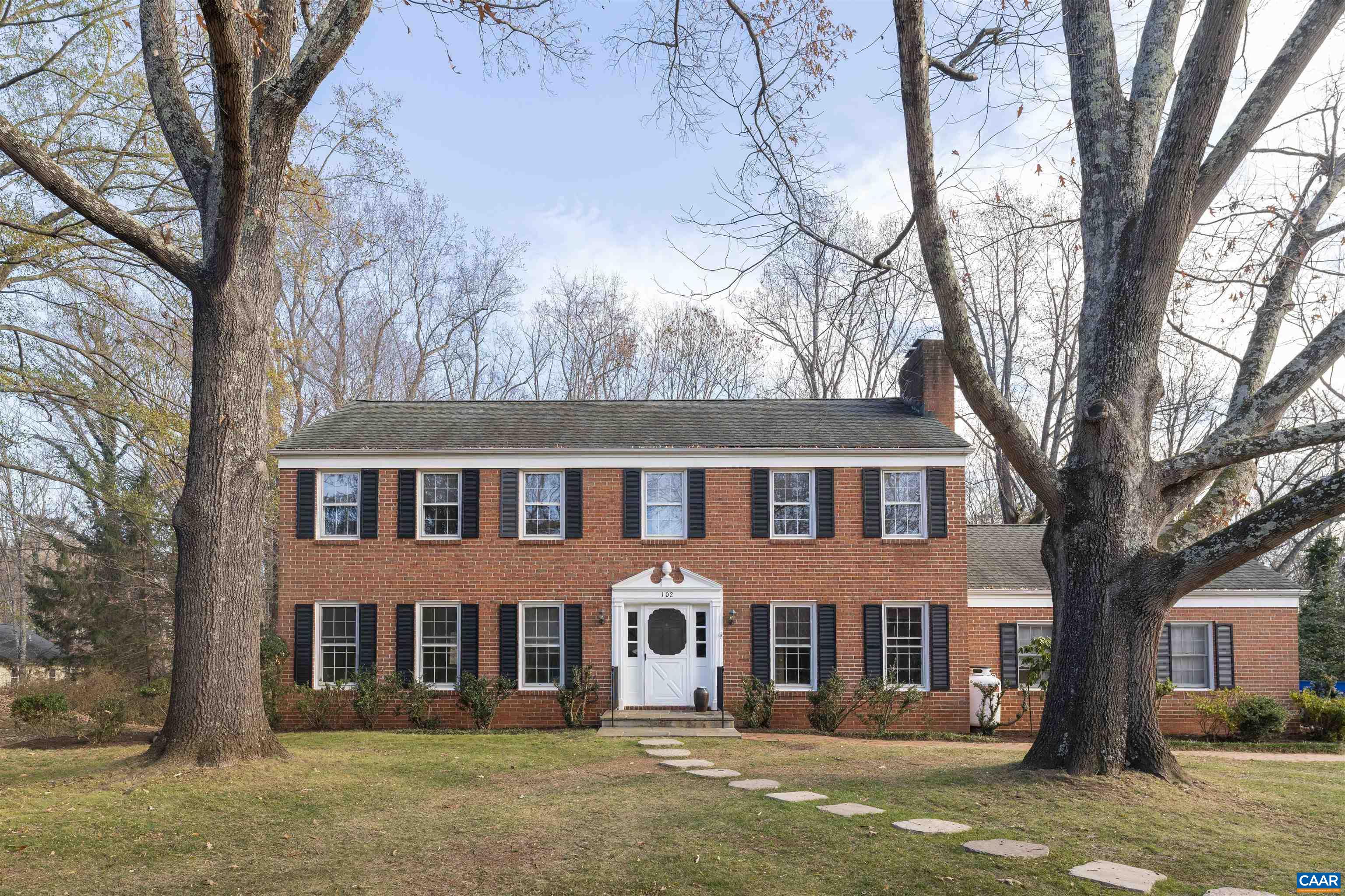 front view of a house with a yard