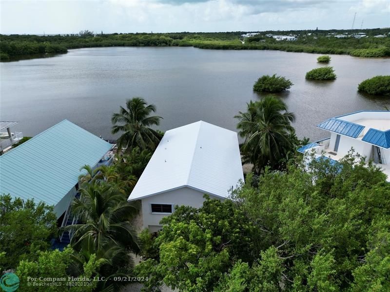 a view of a lake and a yard