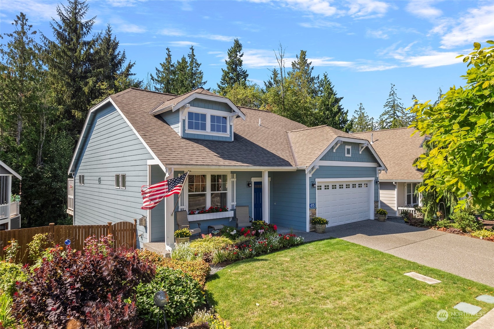 a view of front of house with a yard