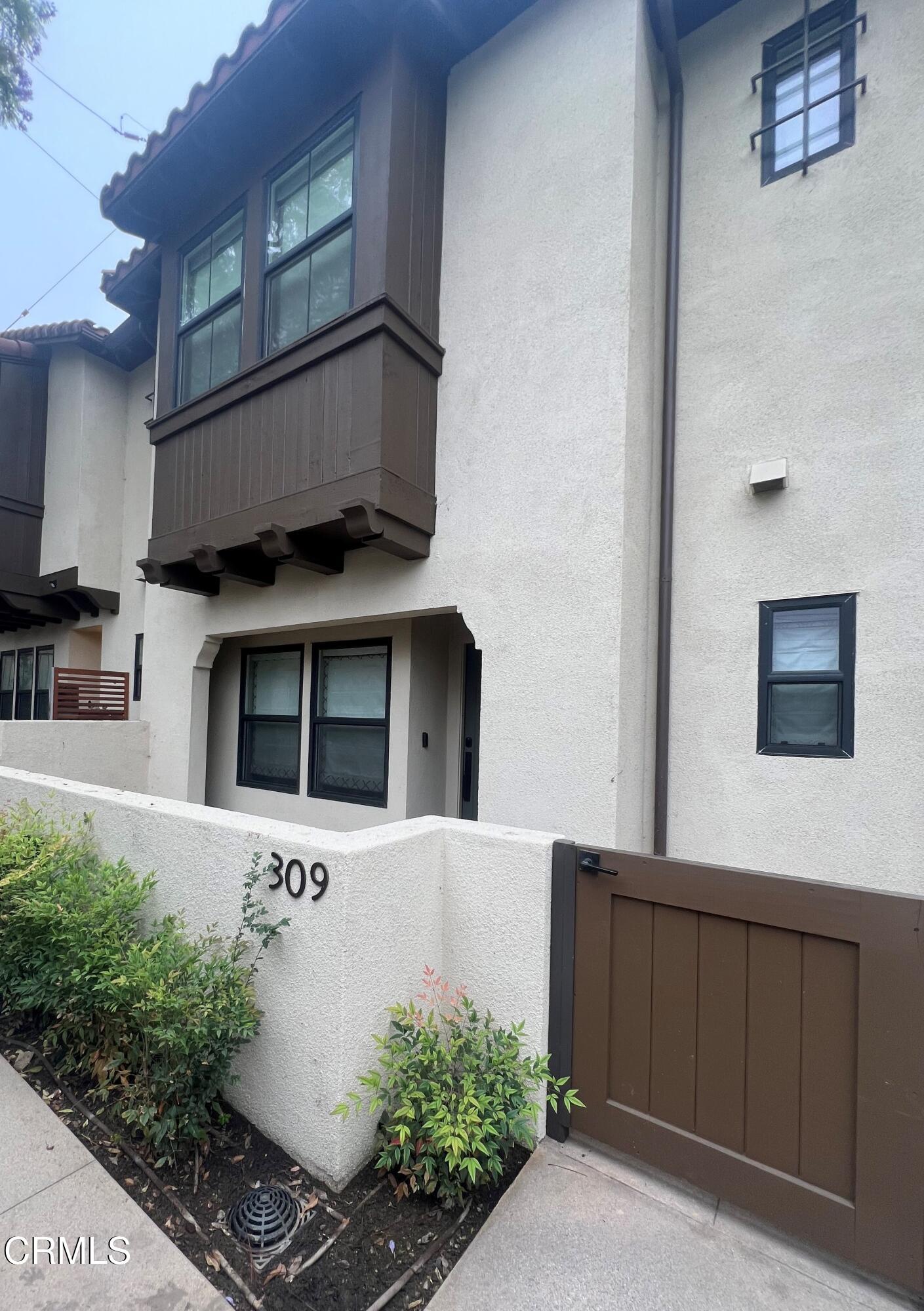 a front view of a house with windows