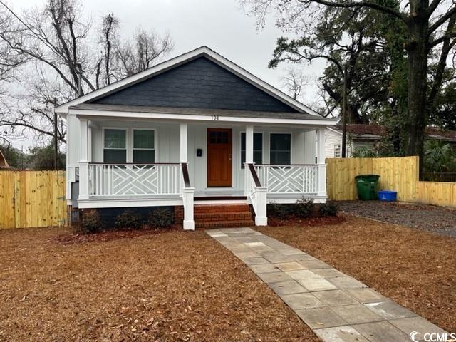 Bungalow featuring covered porch