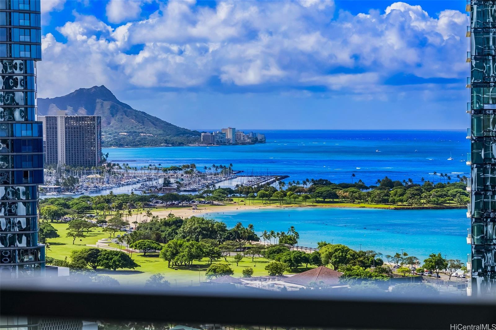 a view of a city with an ocean view