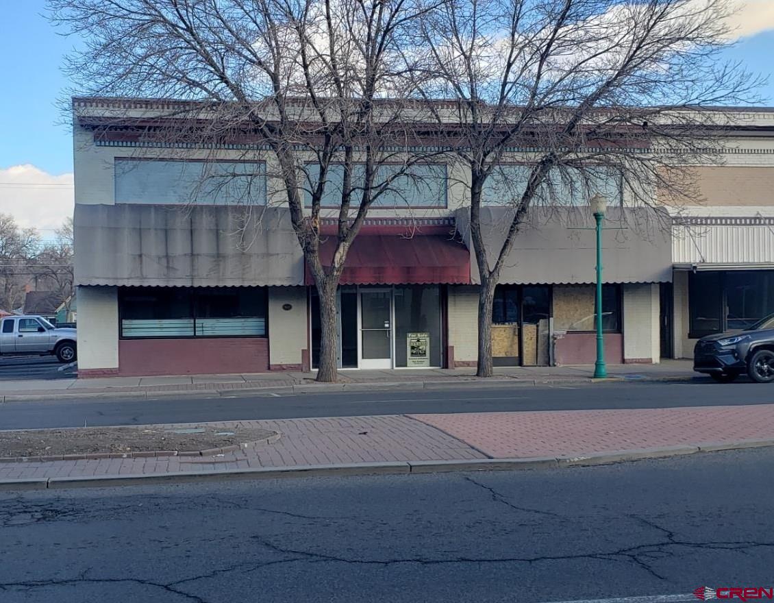 a front view of a building with street