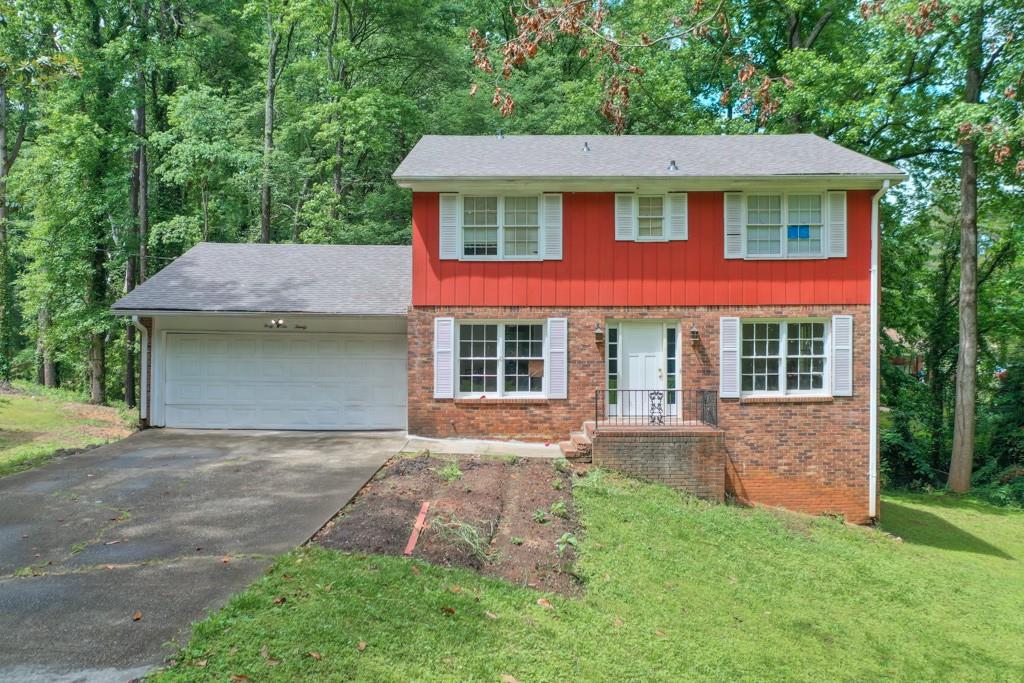 front view of a house with a yard