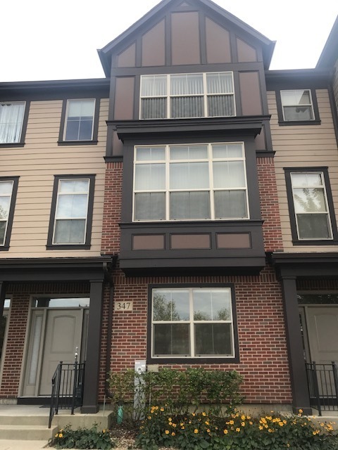 a building with a window and balcony