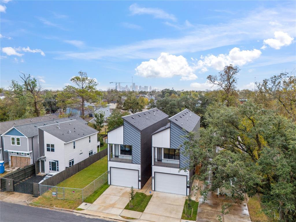 A clean, modern aesthetic meets functional design in this 3-bedroom, 2-bath home, with a spacious full-sized driveway, all crafted by Finish Line Design and Construction LLC