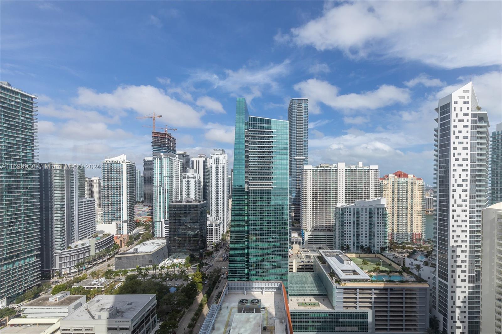 a view of a city with tall buildings